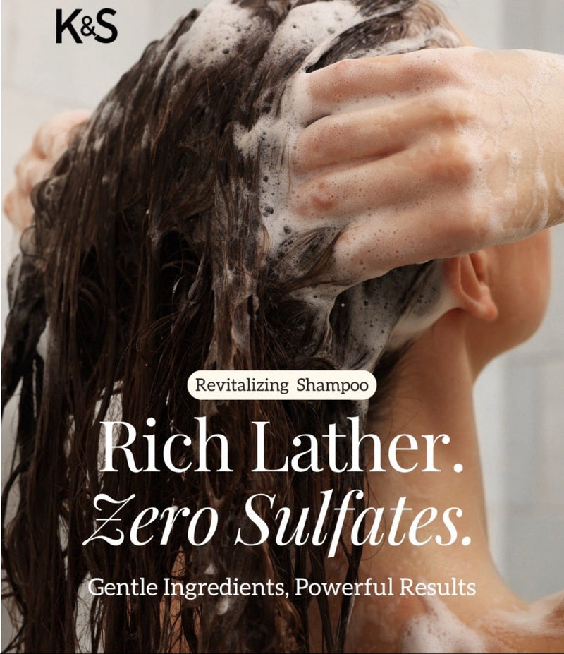 Person washing hair with K&S Revitalizing Shampoo, showing a rich lather and zero sulfates .